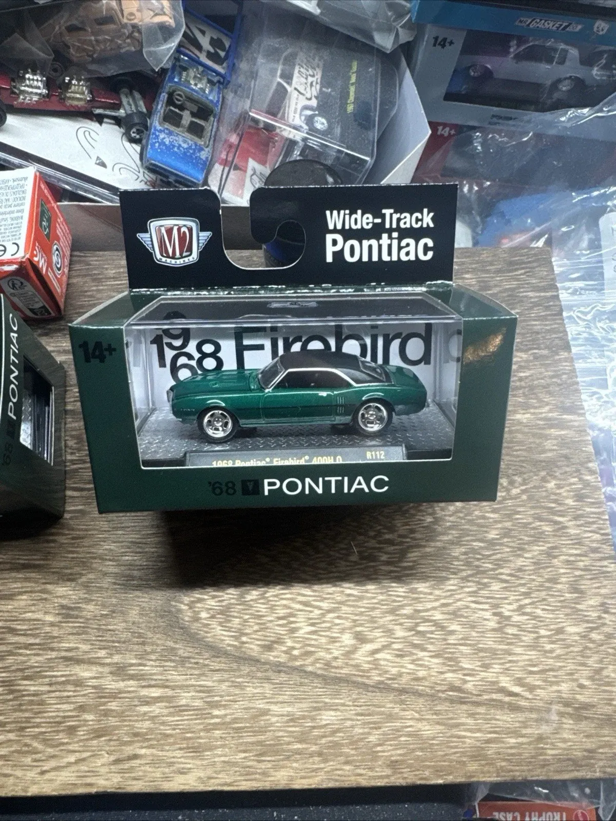 Green 1968 Pontiac Firebird 400 H.O. by M2 Machines in its box