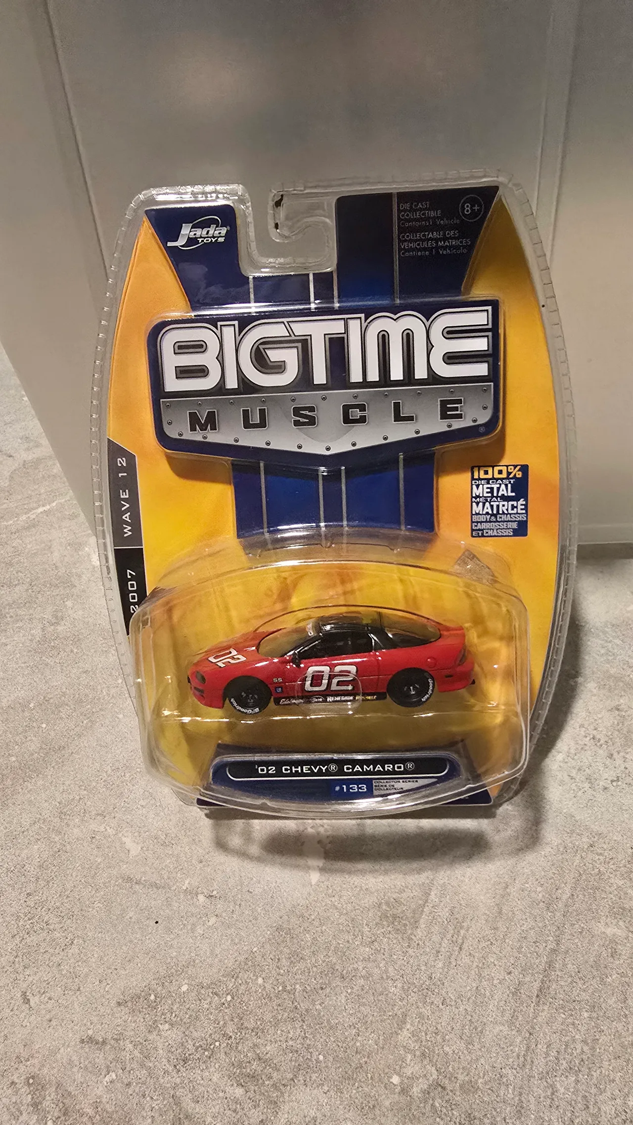 Red #02 2002 Chevy Camaro SS race car with a black roof by Jada Toys, Big Time Muscle, in its blister pack