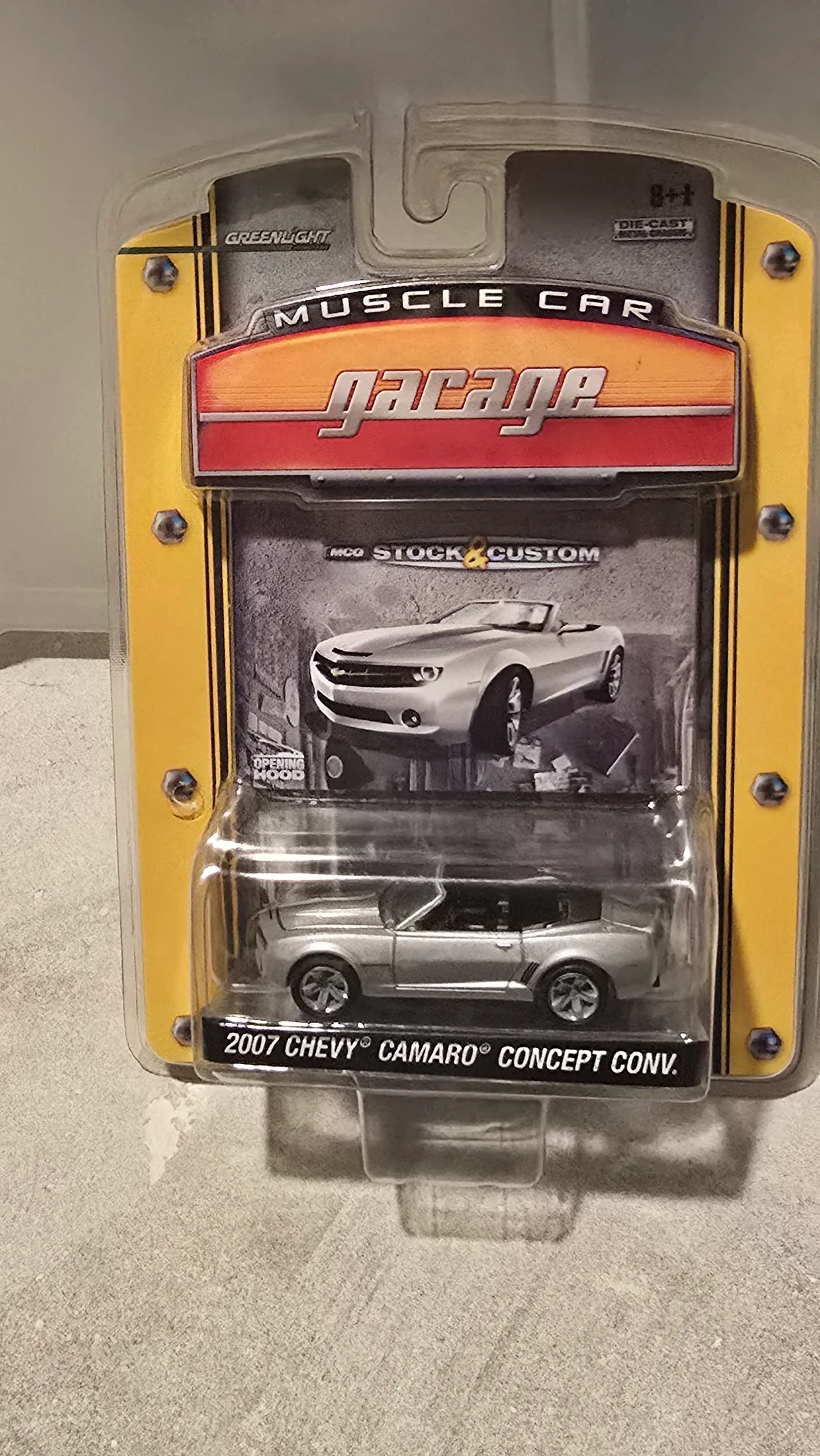 Silver 2007 Chevy Camaro Concept convertible by Greenlight, Muscle Car Garage, in its blister pack