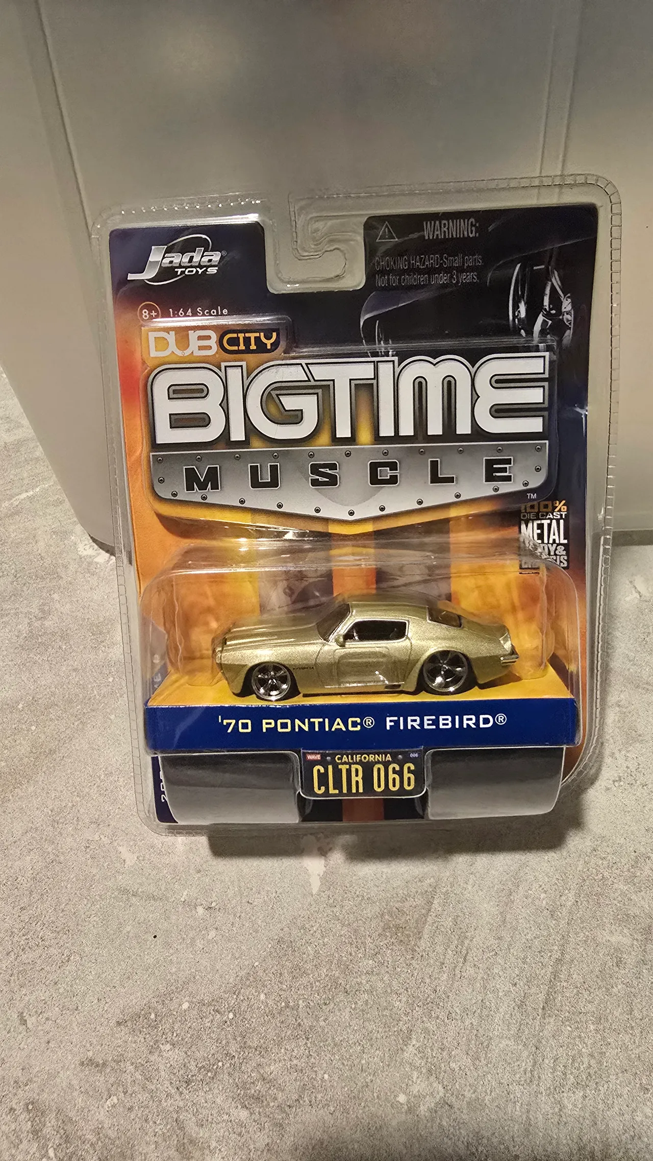 Gold 1970 Pontiac Firebird by Jada Toys, Dub City Big Time Muscle, in its blister pack